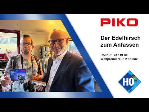 Video: 🚂 Premiere der BR 119 DB in Spur H0 | Modell trifft Vorbild im DB Museum Koblenz