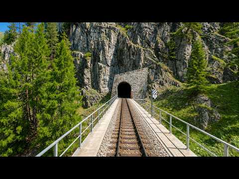 Video: ★ 4K 🇨🇭 St. Moritz - Vereina - Landquart cab ride, Switzerland [07.2021] Longest narrow gauge tunnel